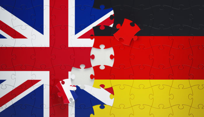 Jigsaw Puzzle Pieces Textured With German and United Kingdom Flags
